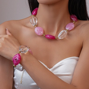 Acrylic irregular oval bead necklace and bracelet set in pink marble finish