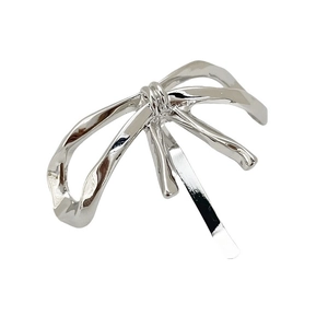 Elegant silver bow-shaped metal hair clip with a polished finish and minimalist design