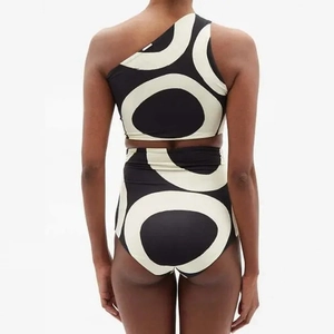 Back view of black and white geometric print one shoulder high waist bikini set