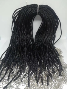 Detail of 2mm black waxed cord necklaces with silver lobster clasps and extension chains