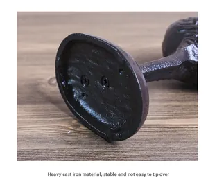 Close-up of stable heavy cast iron base with matte texture for paper towel holder