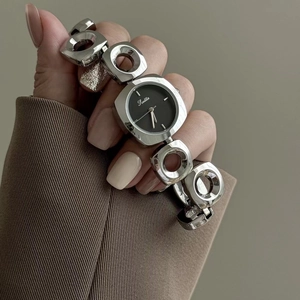 Women's Scottie watch with black square dial and irregular silver hollow bracelet