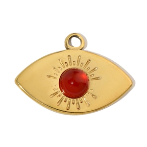 Detail of eye-shaped gold stainless steel pendant with a centered red gemstone