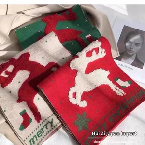 Detailed knit patterns featuring Christmas deer and socks on three festive scarves