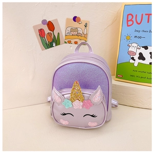 Detail of sequin unicorn backpack for girls with glitter horn and embroidery