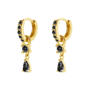 Detail of gold hoop earrings featuring teardrop and round black zircon drop pendants