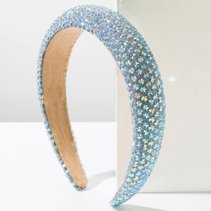 Detailed view of luxury sponge headband with sparkling blue and AB rhinestones
