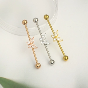 Three-color industrial barbell earring set with crystal butterfly motifs in stainless steel