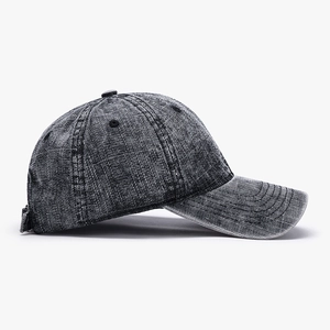 Adjustable washed cotton baseball cap in dark gray denim with vintage acid wash texture
