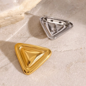 Polished stainless steel geometric triangle brooches in gold and silver finish