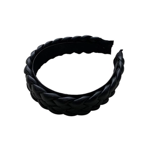 Close-up of black PU leather braided headband featuring high-quality woven texture