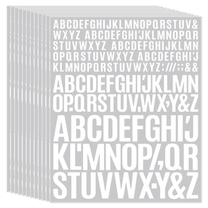 Detailed view of stacked white alphabet stickers featuring letters A-Z and symbols