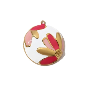 Macro detail of round gold pendant with red and pink floral enamel petals
