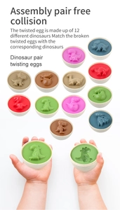 Detail showing a child's hands assembling 12 different colorful dinosaur puzzle eggs