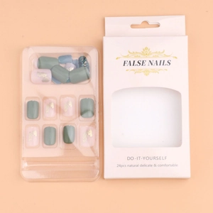Short square green false nails with gold foil flakes and colorful 24pcs manicure set