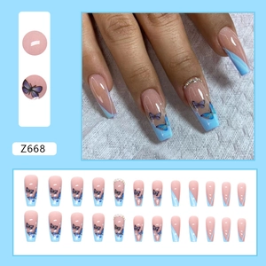 French blue butterfly press-on nails with shiny rhinestones in long coffin shape