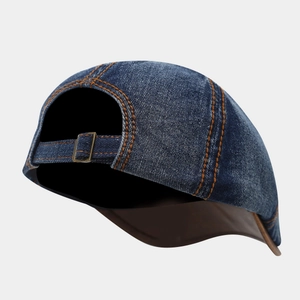 Dark blue denim flat cap for men and women with orange stitching and metal buckle
