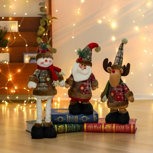 Christmas standing plush doll set with Santa, Snowman and Reindeer on festive books