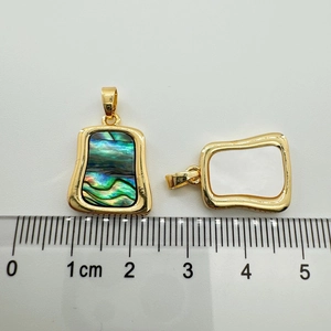 Size measurement showing natural abalone and white shell pendants with gold plating