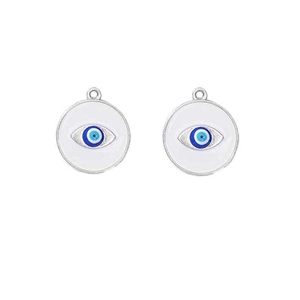Close-up of circular silver evil eye charms with blue and white enamel detail