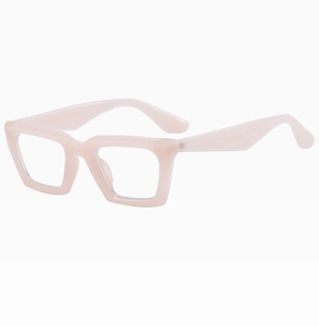 Detailed view of thick retro square cat-eye frame in light pink acetate finish