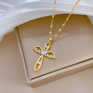 Gold titanium necklace with angel wing heart cross pendant on tile chain jewelry