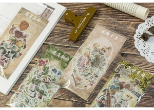 Flat lay of vintage floral washi paper sticker packs for DIY journaling decoration