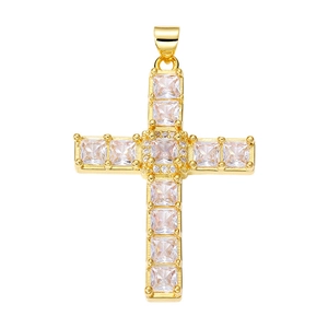 Close-up of gold cross pendant with square cubic zirconia and white pearl details