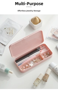 Close-up of pink multifunctional storage box with multiple compartments for stationery and jewelry