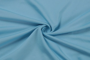 Detail of light blue functional fabric showing micro-hole knit texture and soft drapery