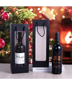 Detail of black paper wine gift bag featuring a transparent window and woven rope handle