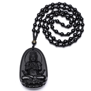 Carved black obsidian Buddha pendant necklace with matching beads and gold mantra charm