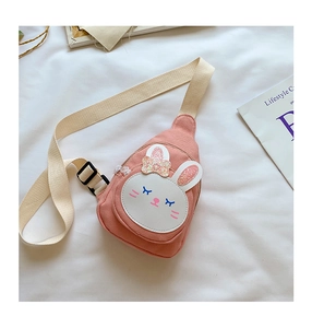 Detail of pink canvas chest bag for kids featuring a cute rabbit face and sequin ears