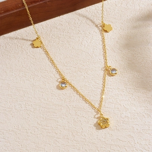 Gold plated stainless steel necklace with sparkling floral and round zircon charms
