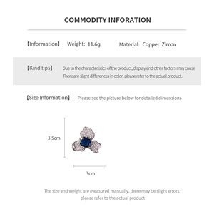 Vue détaillée montrant les dimensions d'une bague fleur vintage avec zircons bleus