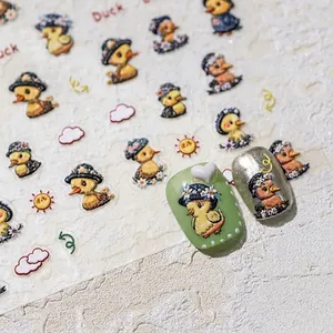 5D embossed nail art stickers featuring elegant cartoon yellow ducks and sun motifs