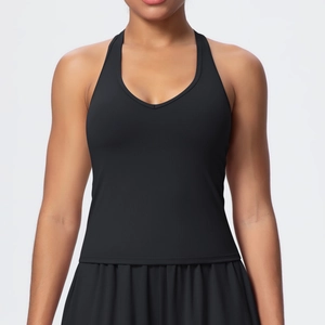 Detail of black V-neck sports bra with racerback design in moisture-wicking fabric