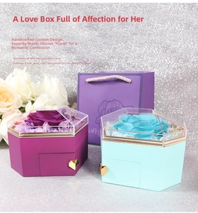 Preserved rose jewelry box with a pull-out drawer and matching love-themed gift bag
