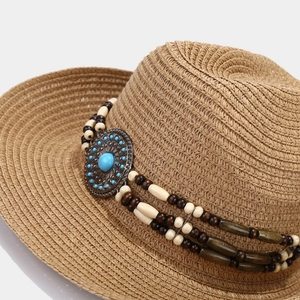 Bohemian brown straw sun hat with ethnic beadwork and turquoise stone detail