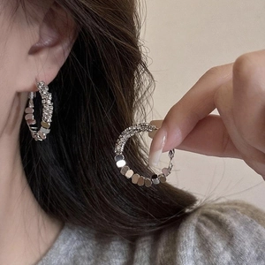 Silver geometric hoop earrings with sparkling rhinestones and polished metal sequins style