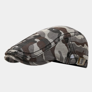 Detail view of the camouflage flat cap with metallic adjustable side buckle and neat stitching