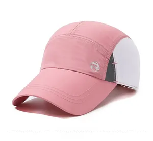 Close-up of pink quick-dry baseball cap with white mesh sides and silver side logo