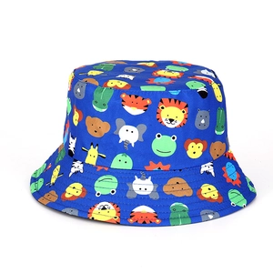 Close-up of blue children's bucket hat with colorful animal prints and detailed stitching