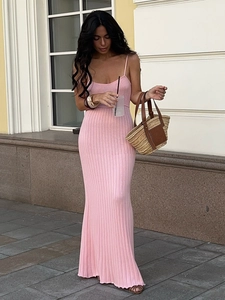 Pink knitted maxi dress with spaghetti straps and ribbed texture in a slim fit silhouette