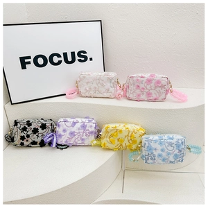 Selection of colorful floral crossbody bags for girls with 3D lace flower details