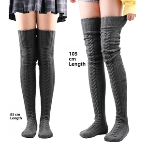 Detail of dark grey cable knit over-knee socks showing 85cm and 105cm length options