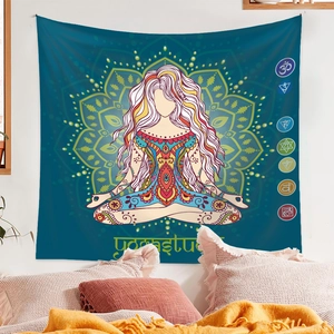 Detail of meditation tapestry featuring chakra symbols and mandala in a bedroom setting