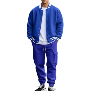 Detail of blue and white baseball jacket collar with ribbed knit and stand-up design