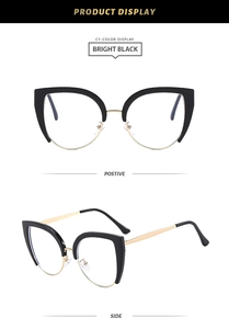Detail of cat-eye semi-rimless frames in bright black with golden metal temples