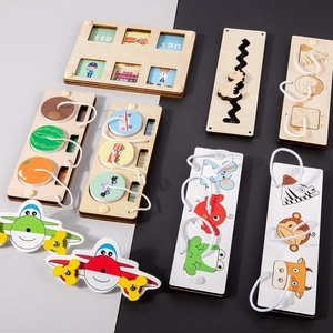 Educational wooden busy board toy with lacing puzzles and colorful vehicle patterns